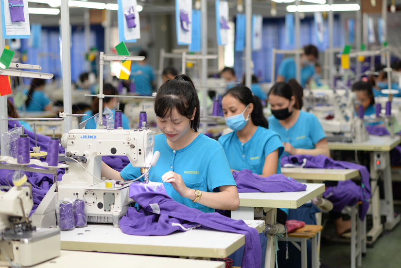 Người lao động tại Hanosimex - Tổng Công ty lớn nằm trong chuỗi cung ứng Sợi - Dệt - May của Vinatex (Ảnh: Hanosimex)