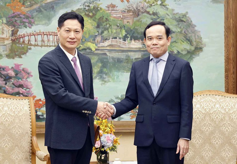 Phó Thủ tướng Chính phủ Trần Lưu Quang và ông Bàng Cương Chí, Chủ tịch HĐQT Tập đoàn An Trí. Ảnh: VGP.