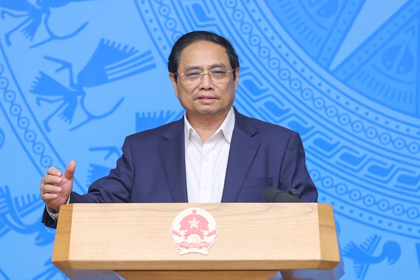 Thủ tướng Phạm Minh Chính kết luận, đã đủ điều kiện chuyển Covid-19 từ bệnh truyền nhiễm nhóm A sang nhóm B. Ảnh: VGP