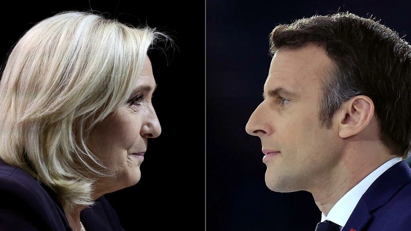 Ứng cử viên cực hữu Marine le Pen (trái) và đương kim Tổng thống Pháp Emmanuel Macron hôm nay sẽ bước vào vòng đấu quyết định. Ảnh: Globe Echo