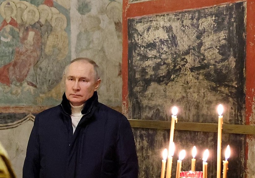 Tổng thống Nga Vladimir Putin tham dự lễ Giáng sinh Chính thống giáo tại Điện Kremlin, ngày 7/1. Ảnh: Sputnik