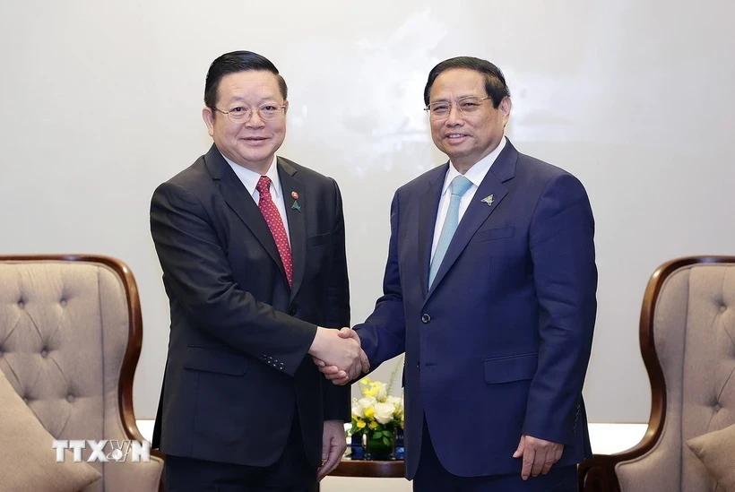 Thủ tướng Phạm Minh Chính tiếp Tổng Thư ký ASEAN Kao Kim Hourn. Ảnh: TTXVN 