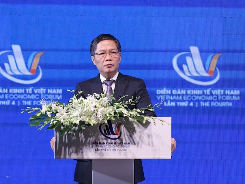 Trưởng ban Kinh tế Trung ương Trần Tuấn Anh phát biểu khai mạc Phiên toàn thể toạ đàm cấp cao. Ảnh: VGP
