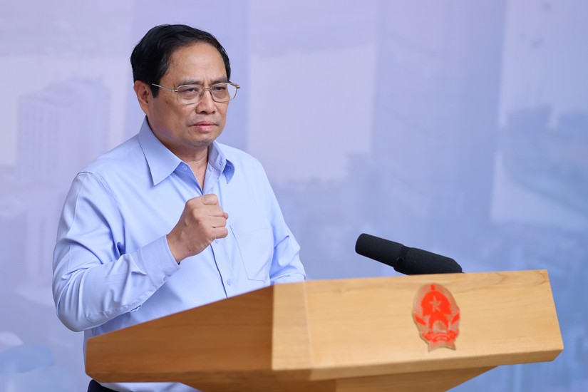 Thủ tướng Phạm Minh Chính tại cuộc làm việc của Thường trực Chính phủ với TP HCM triển khai Nghị quyết 98 ngày 7/7. Ảnh: VGP