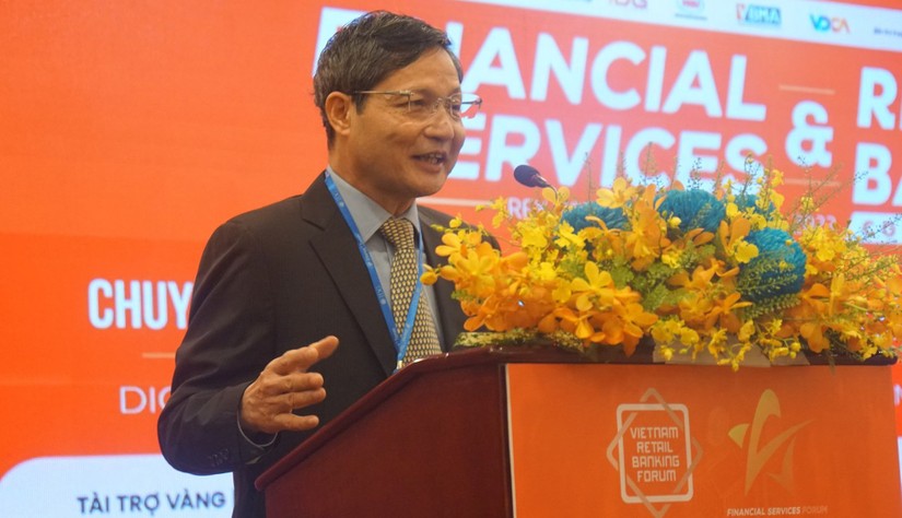 Ông Vũ Viết Ngoạn, nguyên Chủ tịch Ủy ban Giám sát tài chính quốc gia phát biểu tại hội thảo Dịch vụ tài chính - ngân hàng 2023. Ảnh: VGP.