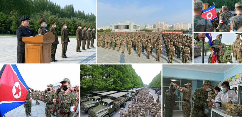 Lực lượng Quân đội Nhân dân Triều Tiên được huy động để chống dịch và phân phát thuốc cho người dân. Ảnh: Rodong Sinmun