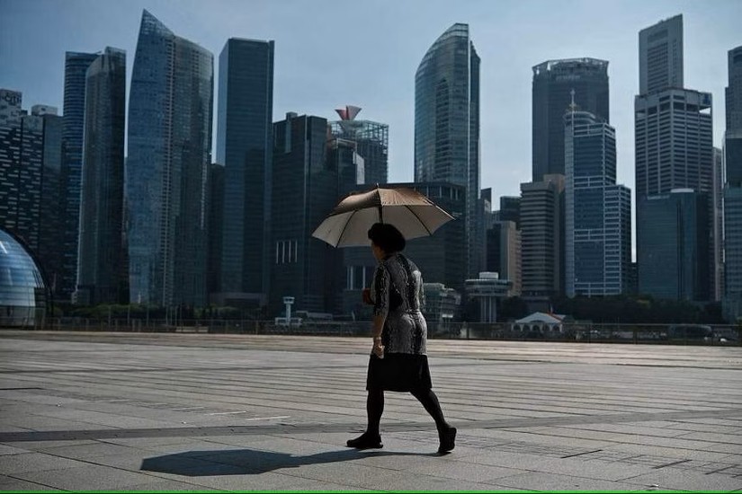 Nhiệt độ cao có thể làm suy giảm năng suất lao động và gây ra thiệt hại kinh tế. Ảnh: Straits Times